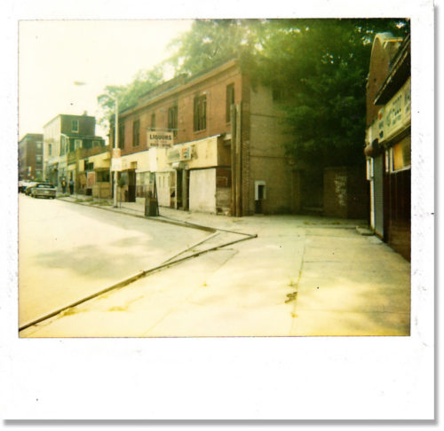 The Whitelock Street business district in Reservoir Hill is shown in a 1980s Polaroid photo. / Image courtesy of the Reservoir Hill Improvement District